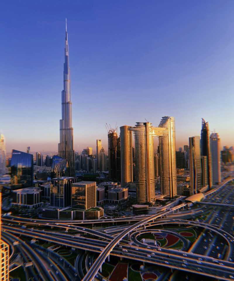 Burj Khalifa downtown Dubai skyline sunset view with city roads