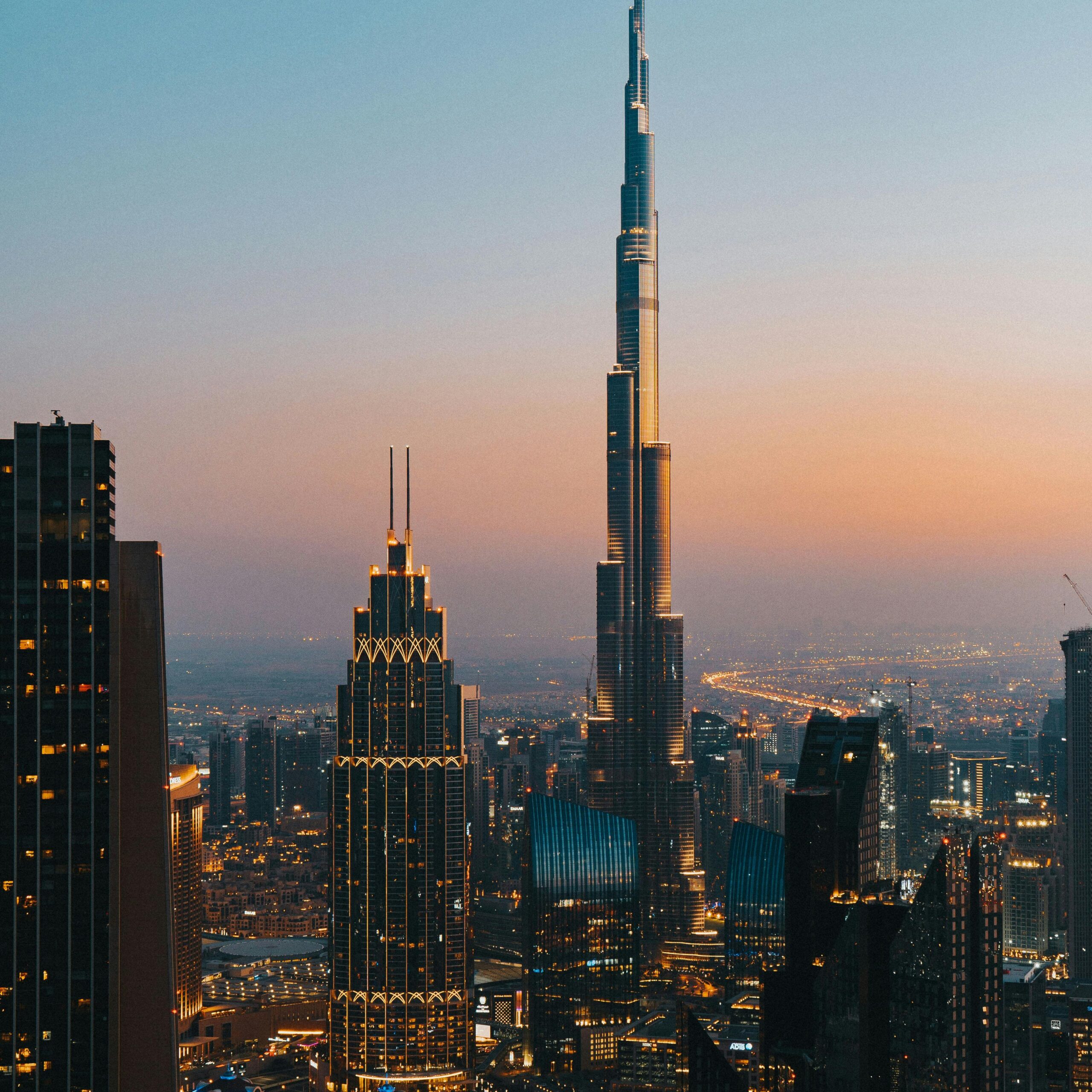 Burj Khalifa Dubai skyline during sunset with city view