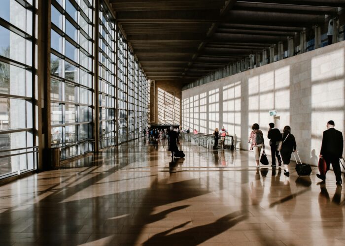 Travelers at airport for UAE visit visa application