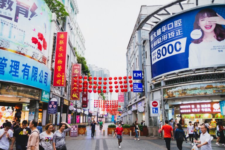 business visitors exploring street market in Guangzhou China during Canton Fair trip