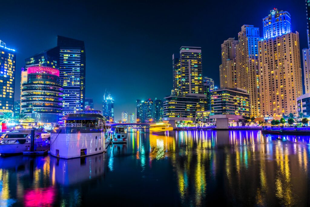 Dubai Marina dhow cruise with skyline views and reflections at night