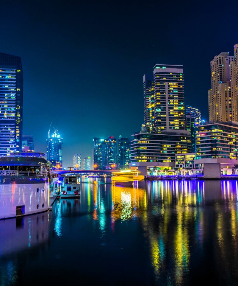 Dubai Marina dhow cruise with skyline views and reflections at night