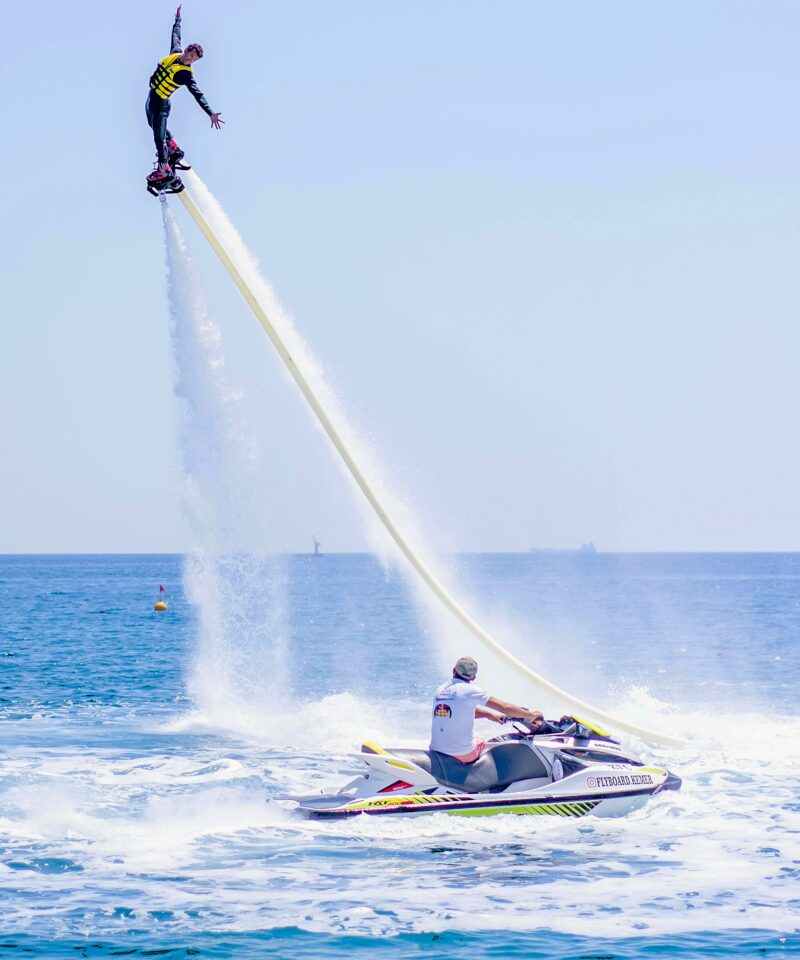 Flyboarding in Dubai with water jet propulsion above the sea