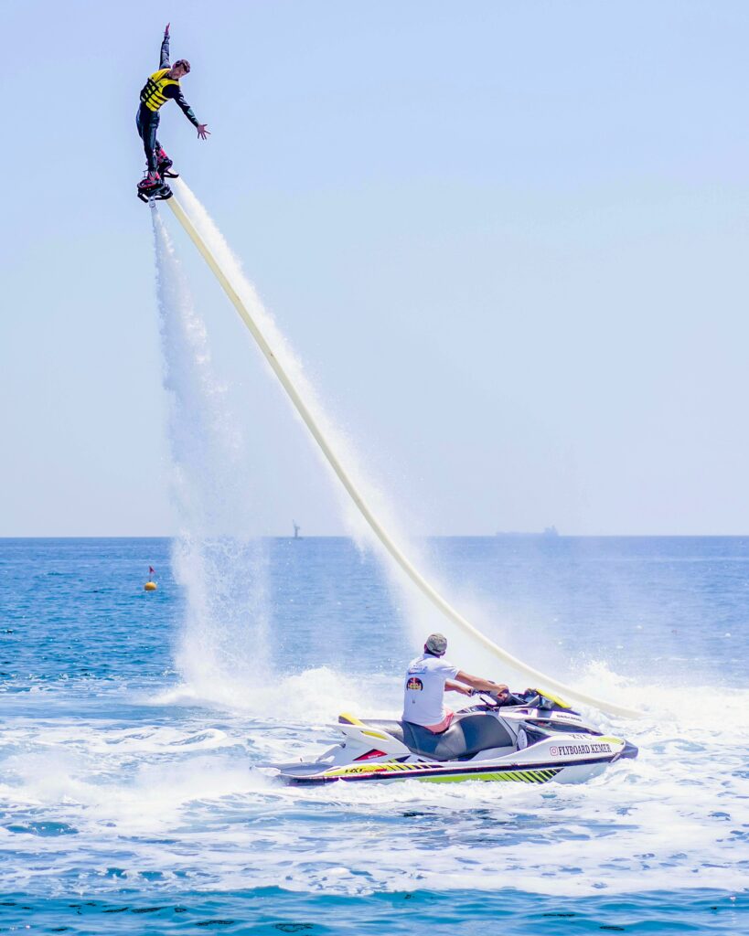 Flyboarding in Dubai with water jet propulsion above the sea