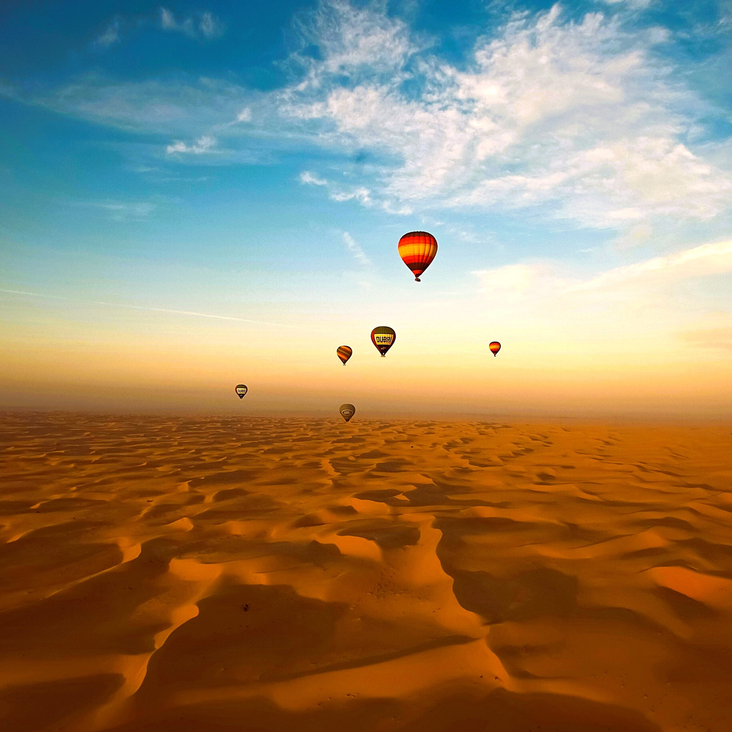 Hot air balloon Dubai desert sunrise thumbnail view