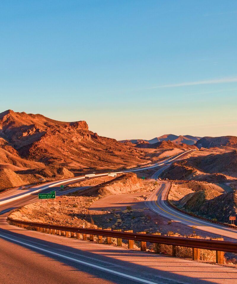 Desert road journey from UAE to Oman for visa run travel