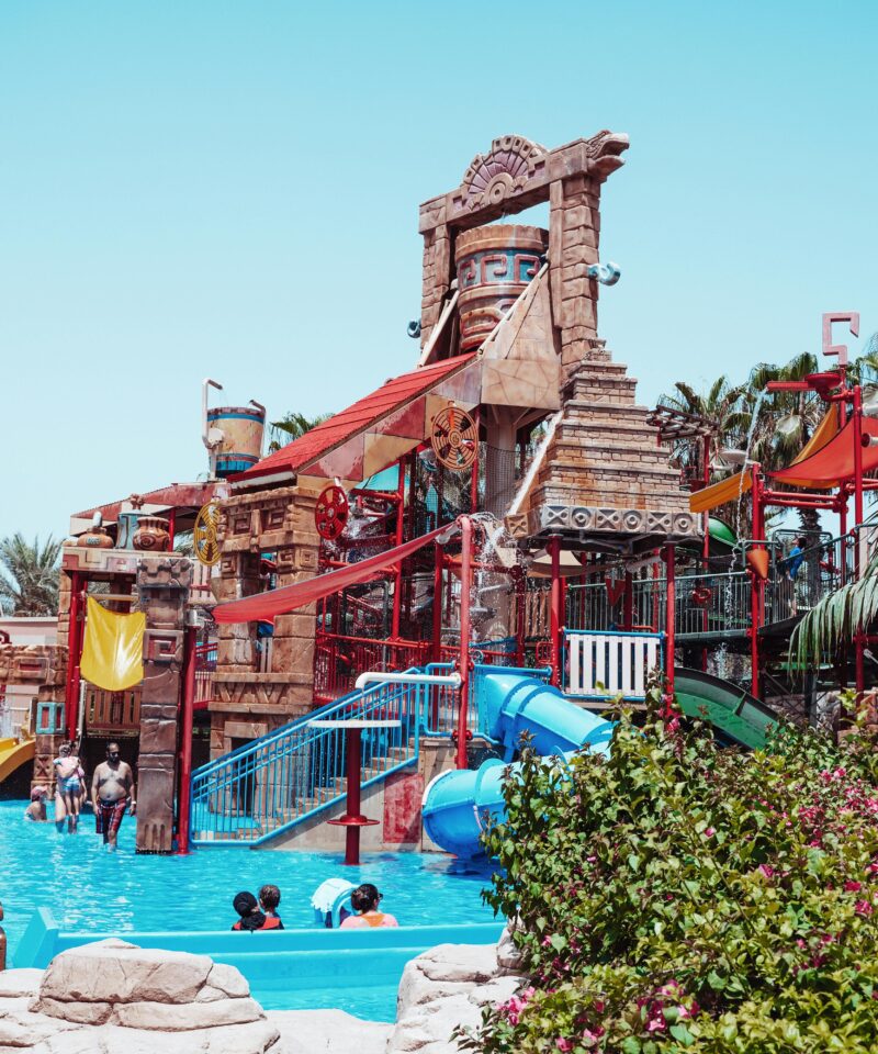 Wild Wadi Dubai waterpark with slides and Burj Al Arab nearby