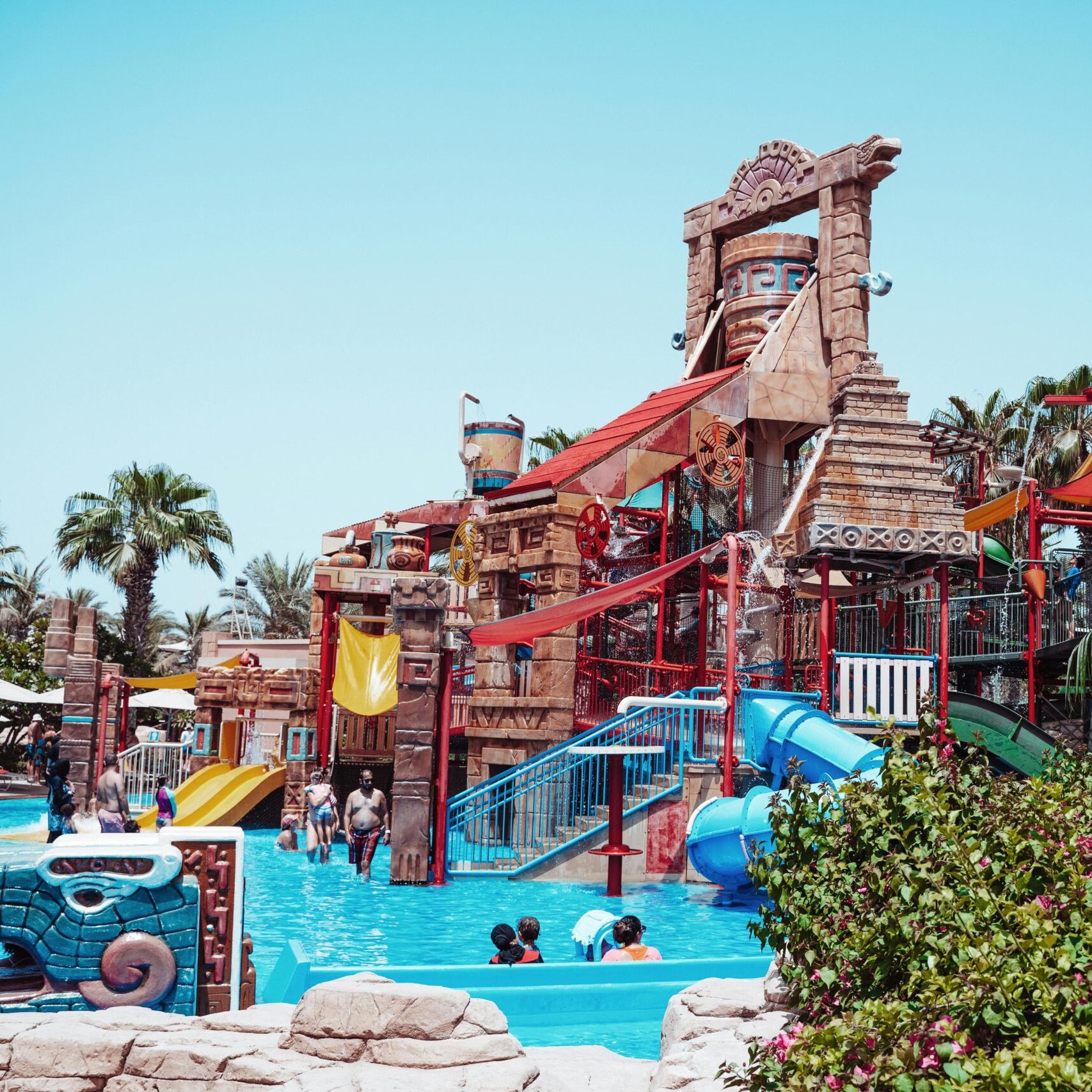 Wild Wadi Dubai waterpark with slides and Burj Al Arab nearby